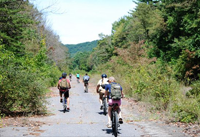Students biking on an old highway