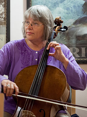 Janet Anthony playing a cello