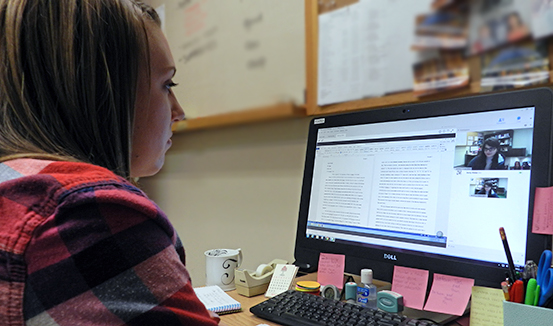 Student at a Writing Center computer