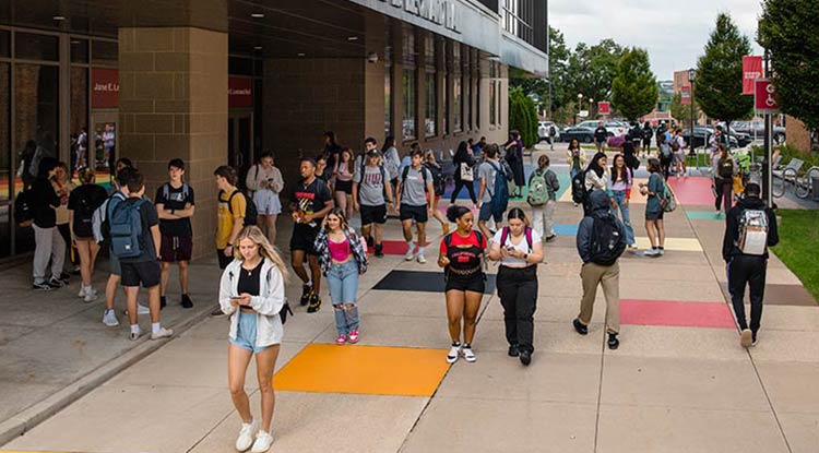 Students walking between buildings between classes