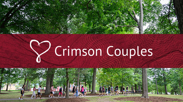 large group of students walking through the oak grove on a summer daylarge group of students walking through the oak grove on a summer day with the words crimson couples superimposed