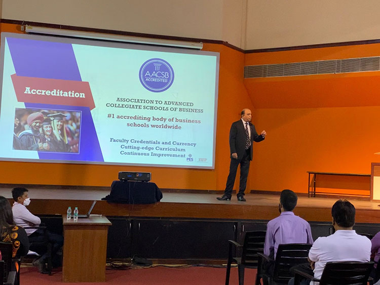 Dean Prashanth Bharadwaj speaking at an open house