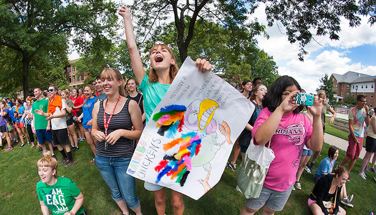 Honors College students cheering in the Oak Grove 