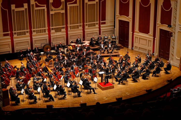 Pittsburgh Symphony Orchestra musicians onstage in performance.