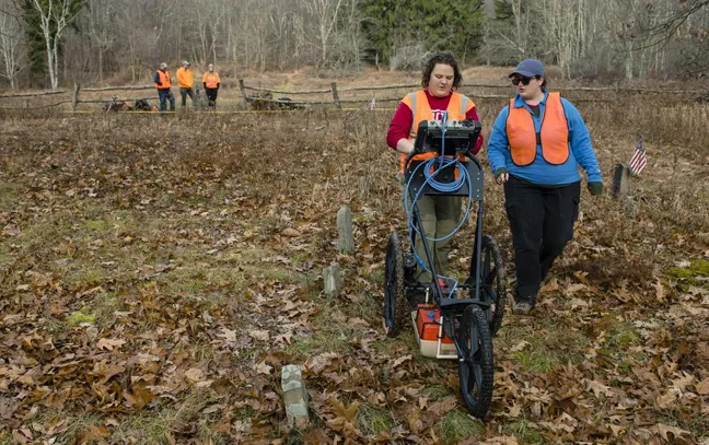 artistic image of a woman waking through a lab