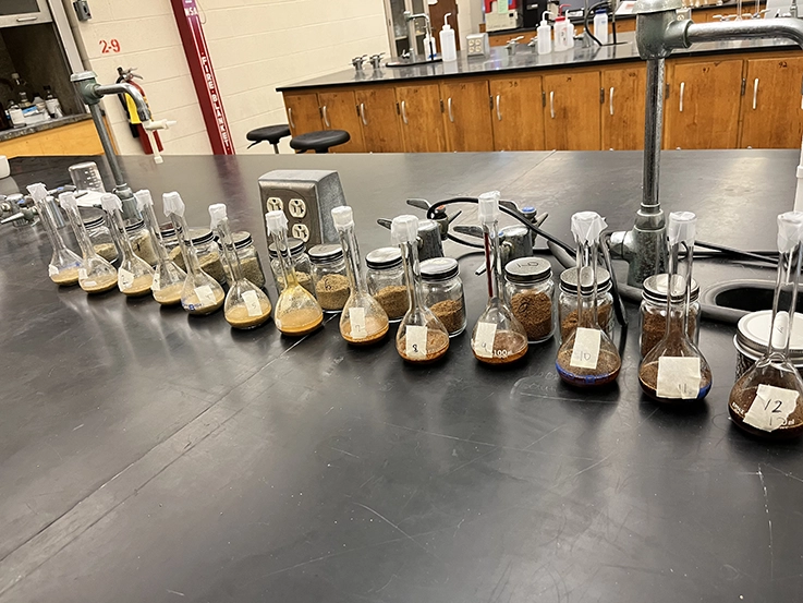 small glass beakers on a lab table