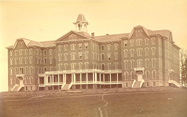 a sepia toned photo of Sutton hall from the early 1900s