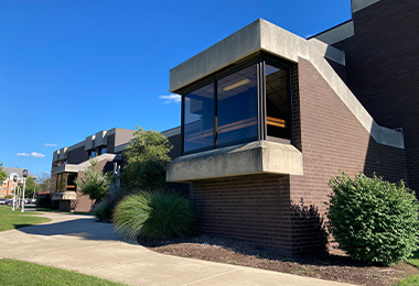 Sidewalk and entrance to Zink Hall.