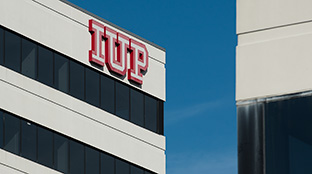 An office building with the IUP logo on it.