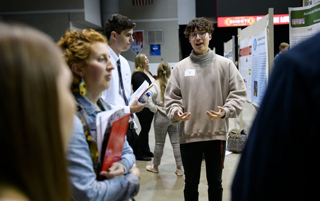 Students talk at the Scholars Forum