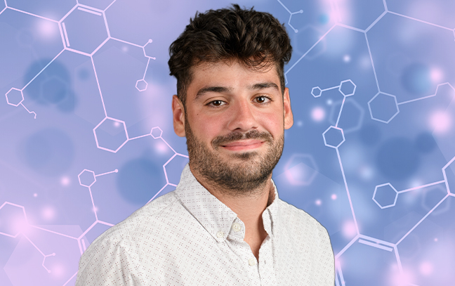 a male student superimposed in front of a purple-colored backdrop with lab equipment
