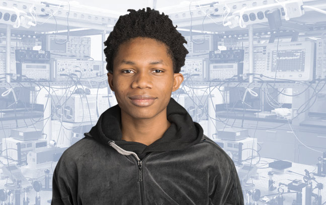 a male student superimposed on a blue backdrop containing lab equipment