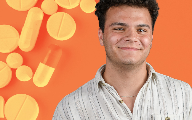 a man superimposed in front of an orange background with pills
