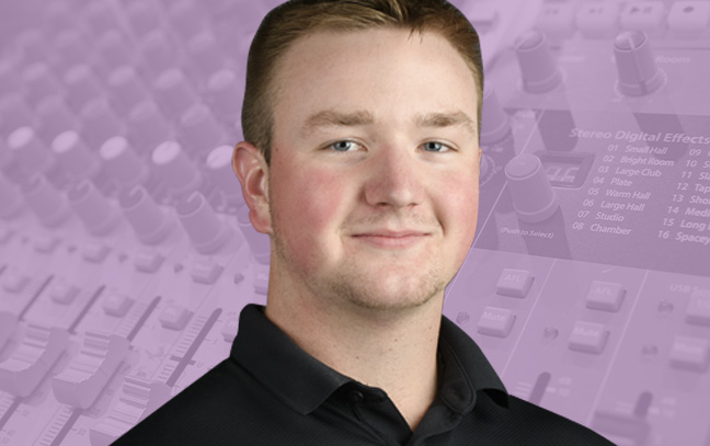 A student being superimposed in front of a sand-pink background with a soundboard.