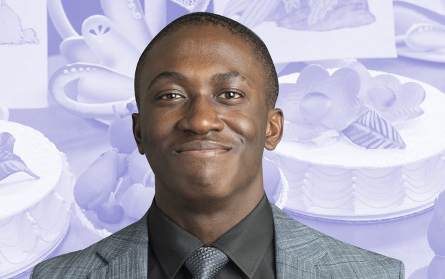 Male student superimposed in front of pink backdrop with cakes