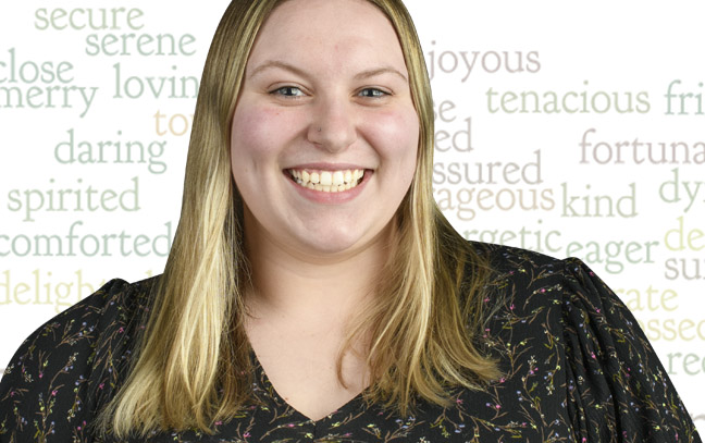 A student being superimposed in front of a light yellow background.