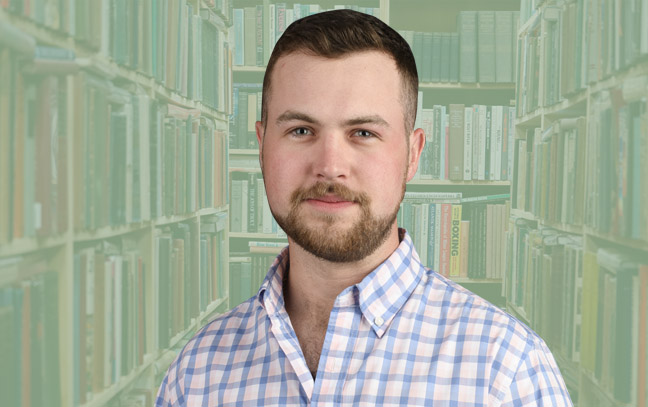 A student being superimposed in front of a green background with bookshelves.