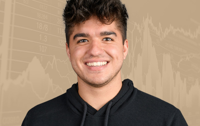 A student being superimposed in front of an orange background showing stock charts and graphs.