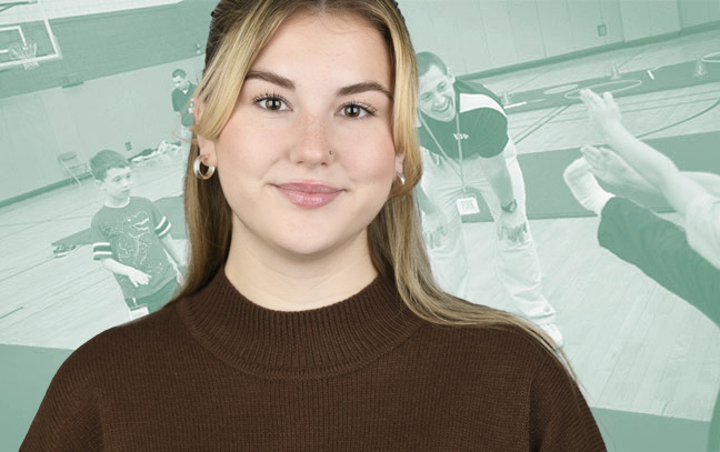 A student being superimposed in front of a sage-green background showing a student teacher leading a group of children in activities in a gym.