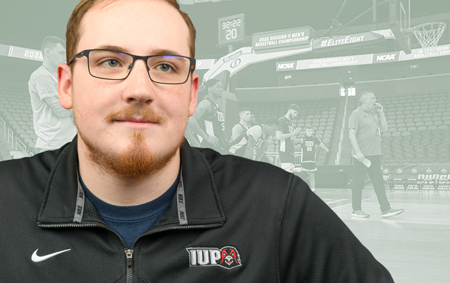 A student being superimposed in front of a sage-green background showing a basketball team in a basketball stadium.