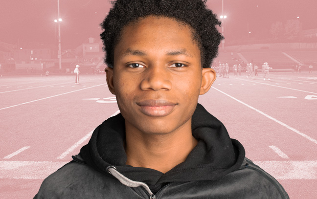 A student being superimposed in front of a hot-pink background with a football team playing in a football field.