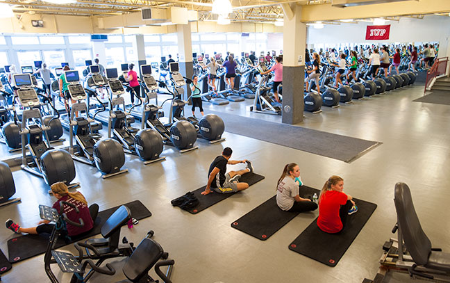 an exercise class in a large gym