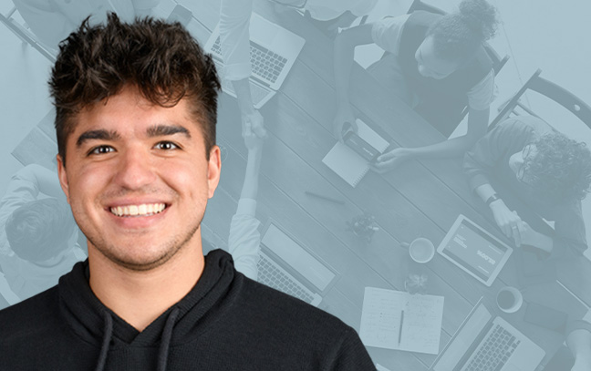 A student being superimposed in front of a blue background showing people working at a table.