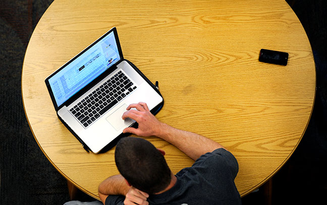 overhead shot of someone on a laptop