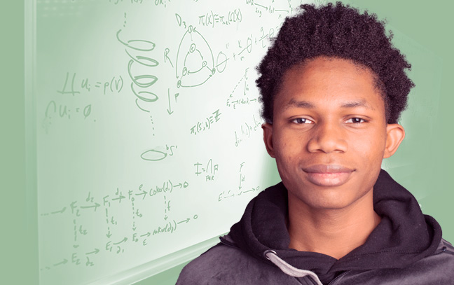 A student being superimposed in front of a green background showing a whiteboard with formulas drawn on it.