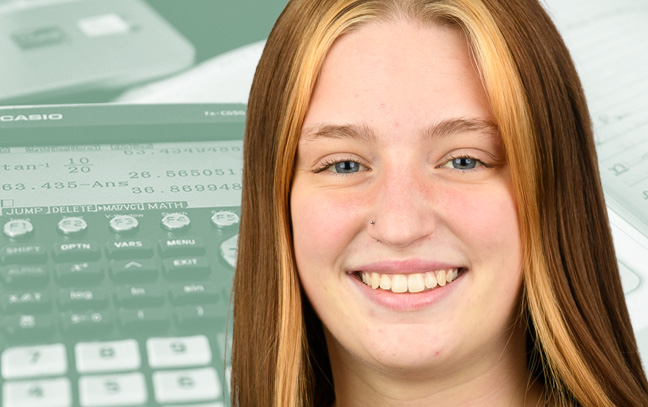 A student being superimposed in front of a sage-green background showing notes and a calculator.