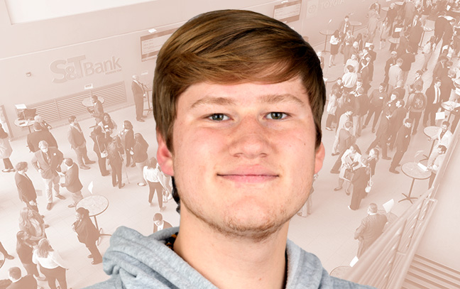 A student being superimposed in front of an orange background showing a business event being held inside the KCAC.