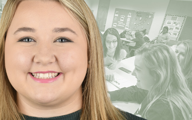 A student being superimposed in front of a sage-green background showing three students looking at a computer screen in a busy room.