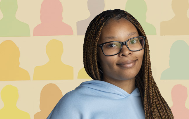 a woman's face in front of a colorful background