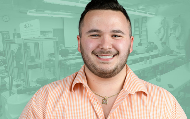 A student being superimposed in front of a green background showing what looks to be a laboratory.