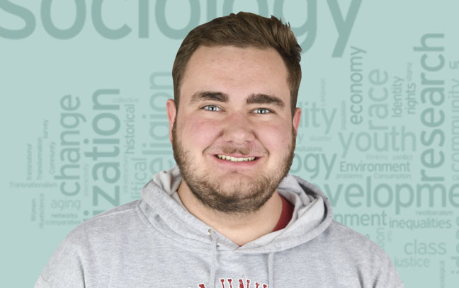 Young man's face superimposed in front of green background with word cloud