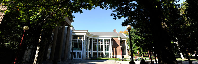 Performing Arts Center under trees in the IUP Oak Grove