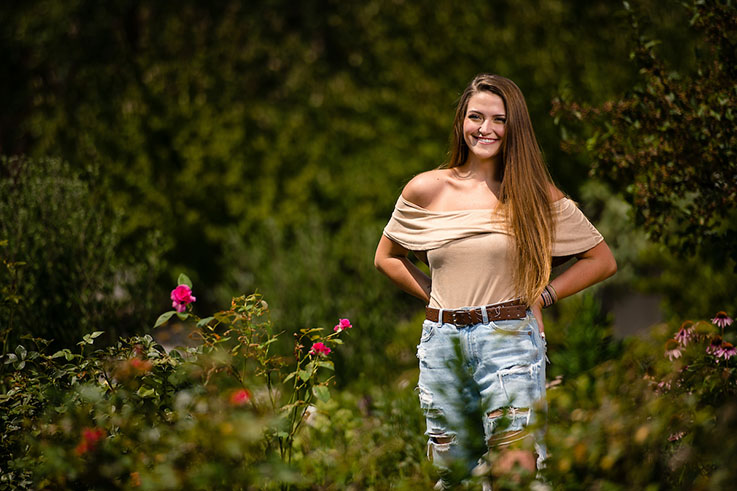 Makenna smiles on campus.
