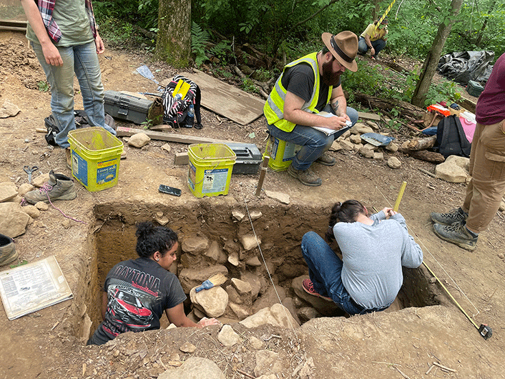 Students digging at the 2021 Archaeological Field School Students digging at the 2021 Archaeological Field School