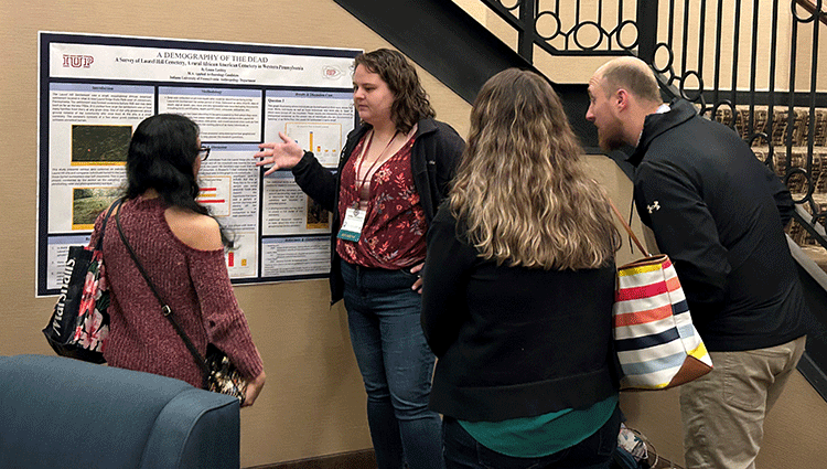 Emma Lashley presenting poster at Society for Pennsylvania Archaeology 2024 conference