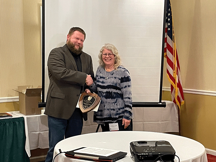 Ford receiving J Alden Mason Award at Society for Pennsylvania Archaeology meetings