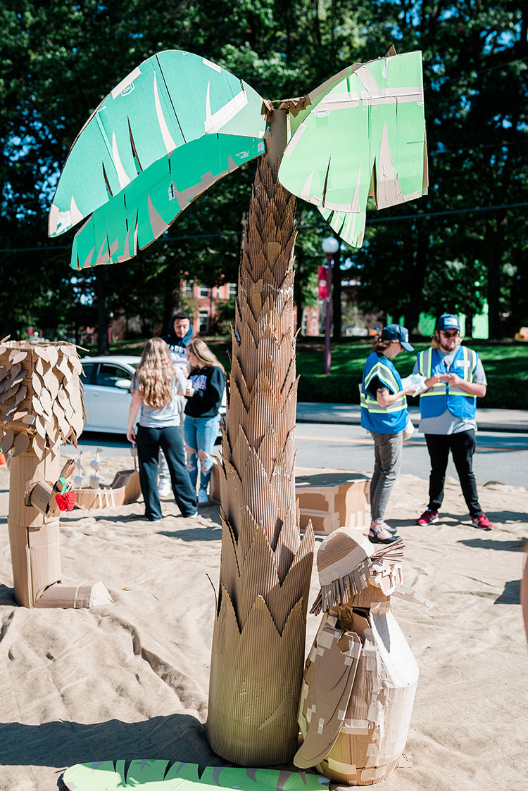 cardboard palm tree and penguin