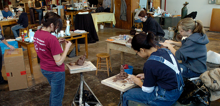 IUP art students in a sculpture class