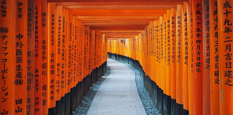 Kyoto door with bright orange-red slats forming a pathway on both sides