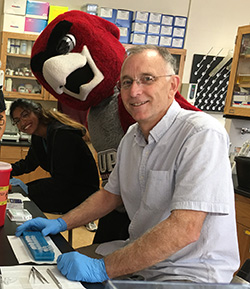 Tom Simmons and Norm in the lab