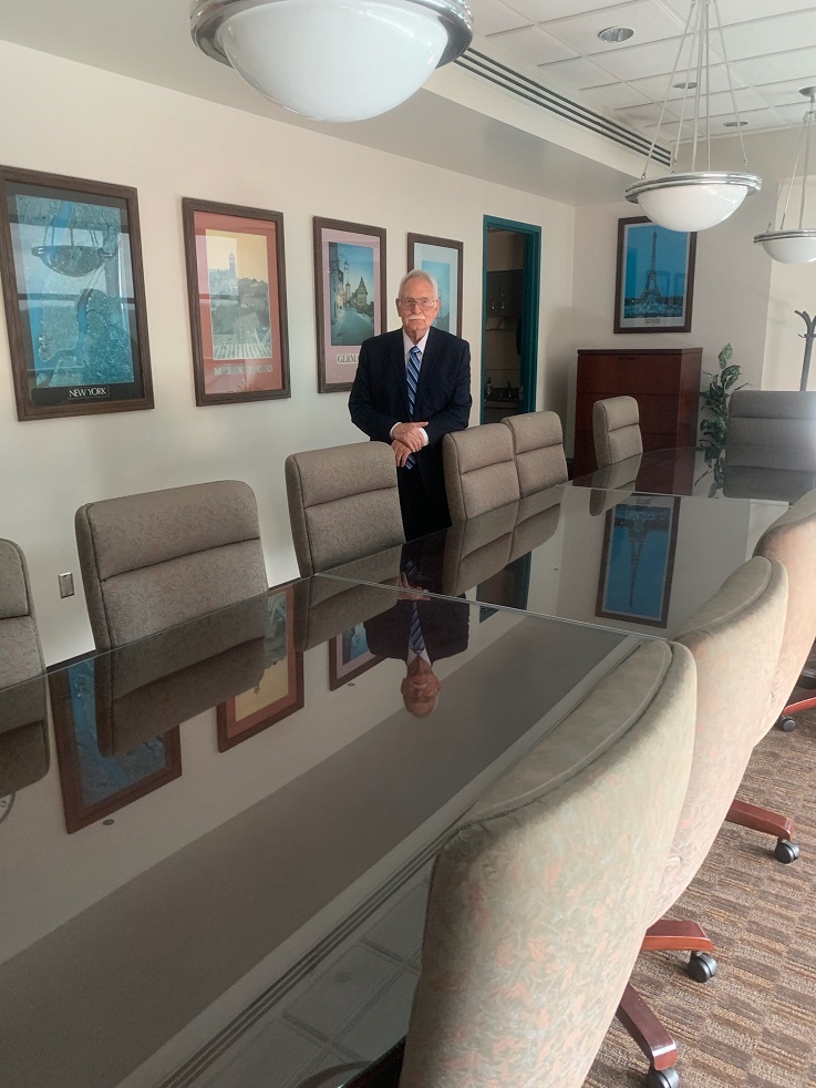 Dr. Robert C. Camp in the Robert C. Camp conference room in the Eberly Dean's suite.