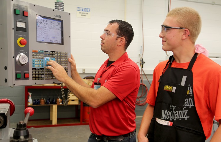 Machining instructor and student