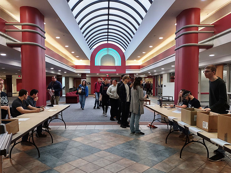 Students checking in for the Physics Olympics