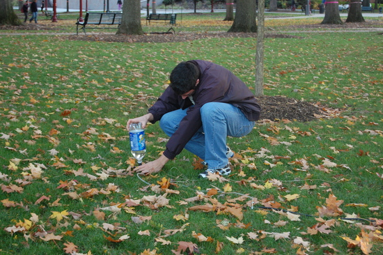 Student conducting project outside 