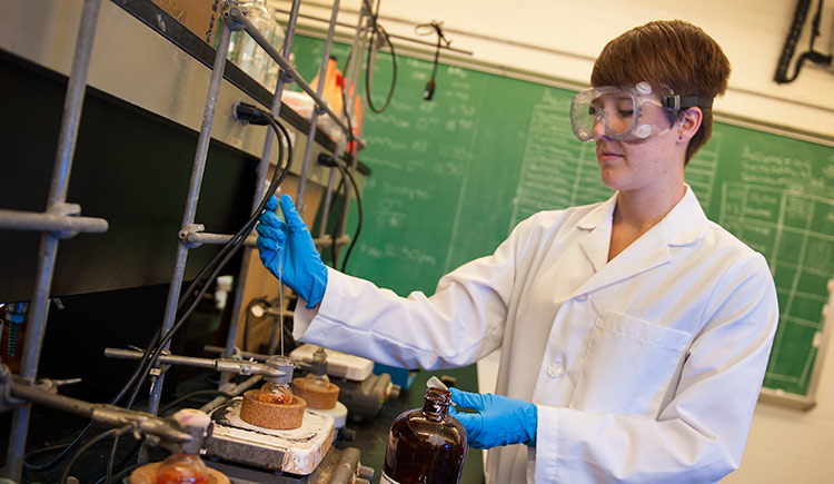 A student works in a chemistry lab.