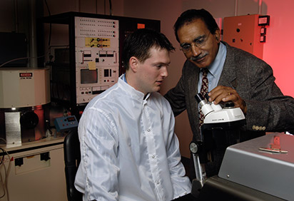 Student and professor in a lab
